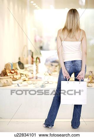 Stock Image - Shoe shopping. Fotosearch