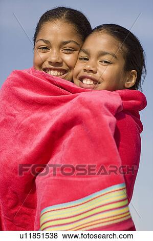 Stock Photo - Sisters on holiday. Fotosearch