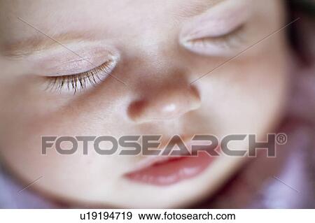 Sleeping baby girl View Large Photo Image Stock Photo - Sleeping baby girl. Fotosearch