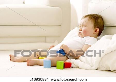 Sleeping baby View Large Photo Image Picture - Sleeping baby. Fotosearch