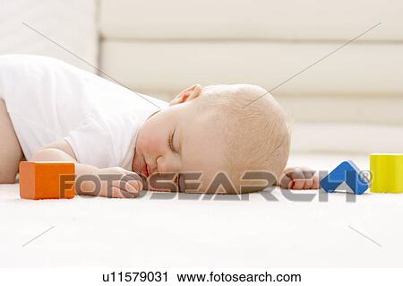 Sleeping baby View Large Photo Image Stock Image - Sleeping baby. Fotosearch