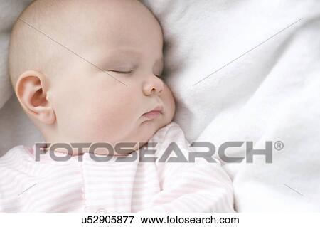 Sleeping baby View Large Photo Image Stock Photo - Sleeping baby. Fotosearch