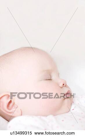 Sleeping baby View Large Photo Image Stock Photography - Sleeping baby. Fotosearch
