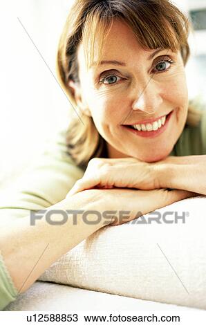 Stock Image - Smiling woman. Fotosearch