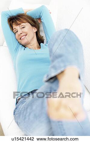Stock Image - Smiling woman. Fotosearch