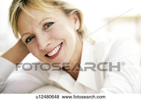 Smiling woman View Large Photo Image Stock Photo - Smiling woman. Fotosearch