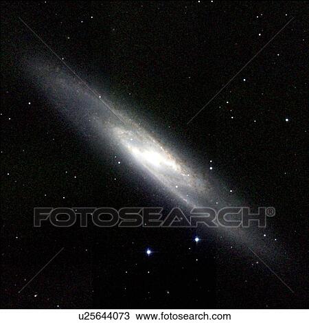 Stock Image - Spiral galaxy NGC 253. Fotosearch