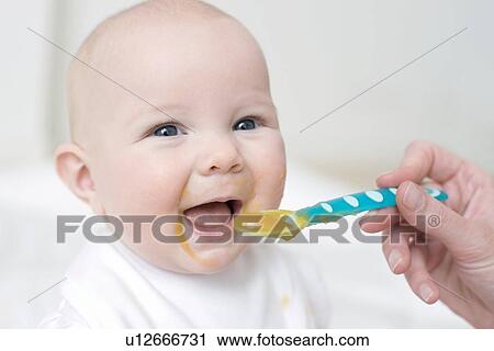 Spoon-feeding View Large Photo Image Stock Image - Spoon-feeding. Fotosearch
