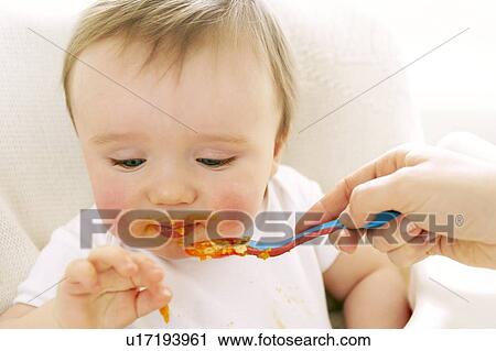 Spoon-feeding View Large Photo Image Stock Image - Spoon-feeding. Fotosearch