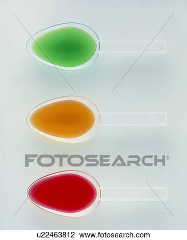 Spoons of medicine View Large Photo Image Stock Image - Spoons of medicine. Fotosearch