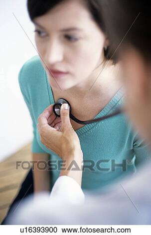 Stock Image - Stethoscope examination. Fotosearch