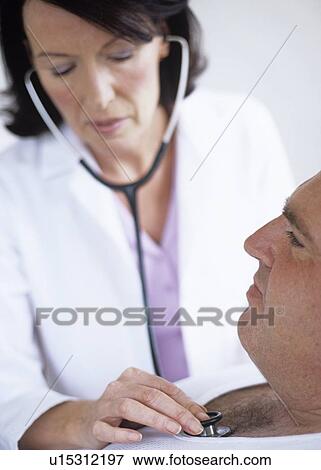 Stock Photo - Stethoscope examination. Fotosearch