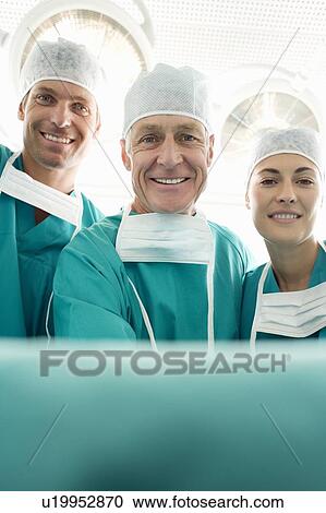 Surgical team View Large Photo Image Stock Image - Surgical team. Fotosearch