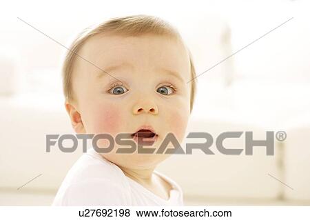 Stock Photo - Surprised baby boy. Fotosearch