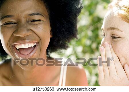 Teenage friends laughing View Large Photo Image Stock Image - Teenage friends laughing. Fotosearch