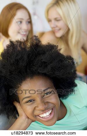 Stock Image - Teenage friends. Fotosearch