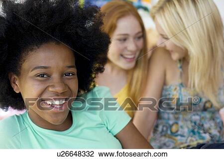 Stock Image - Teenage friends. Fotosearch