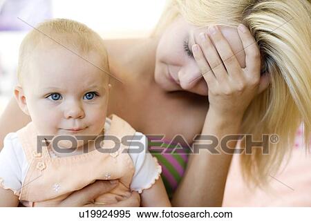 Stock Photography - Teenage mother and baby. Fotosearch