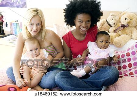Stock Image - Teenage mothers. Fotosearch