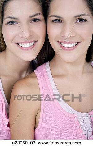Teenage twin sisters View Large Photo Image Stock Image - Teenage twin sisters. Fotosearch