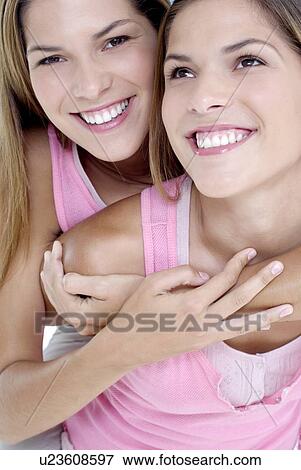 Teenage twin sisters View Large Photo Image Stock Photo - Teenage twin sisters. Fotosearch