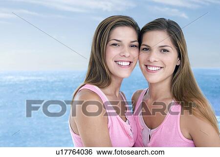 Teenage twin sisters View Large Photo Image Stock Photograph - Teenage twin sisters. Fotosearch