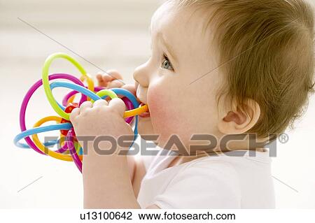 Teething baby View Large Photo Image Stock Image - Teething baby. Fotosearch
