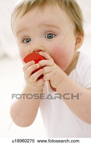 Teething baby View Large Photo Image Stock Photography - Teething baby. Fotosearch