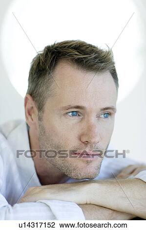 Thoughtful man View Large Photo Image Stock Image - Thoughtful man. Fotosearch