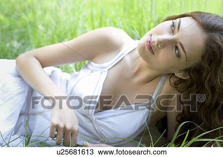 Stock Image - Thoughtful woman. Fotosearch