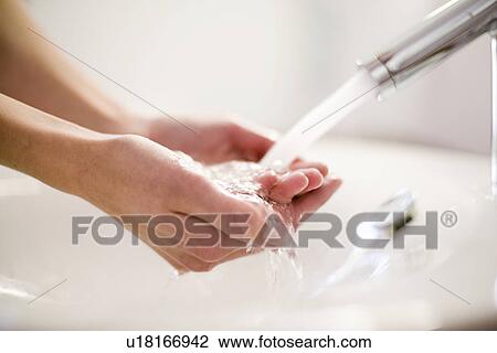 Stock Image - Washing hands. Fotosearch