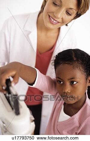 Weight check-up View Large Photo Image Stock Image - Weight check-up. Fotosearch