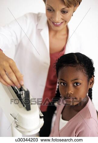 Stock Image - Weight check-up. Fotosearch