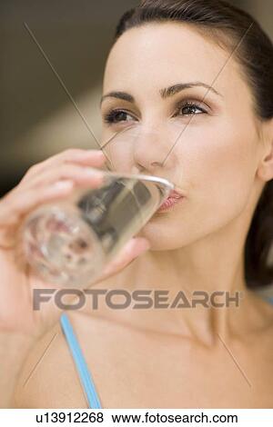 Stock Photo - Woman drinking water. Fotosearch