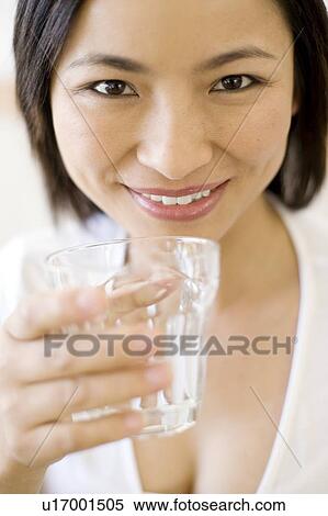 Stock Photography - Woman drinking water. Fotosearch