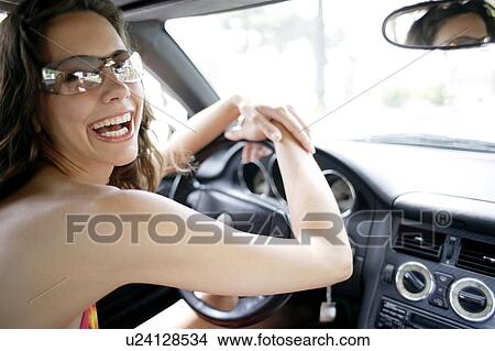 Woman driving View Large Photo Image Picture - Woman driving. Fotosearch