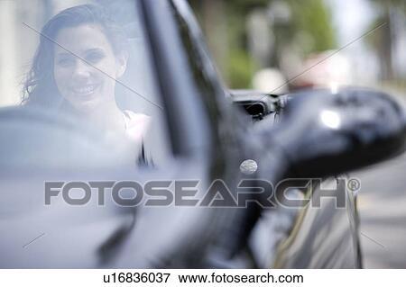 Stock Photo - Woman driving. Fotosearch