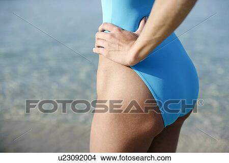 Picture - Woman in a swimsuit. Fotosearch