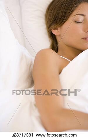 Stock Image - Woman sleeping. Fotosearch