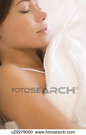 Stock Image - Woman sleeping. Fotosearch
