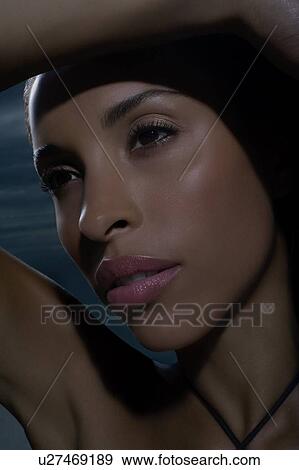 Stock Photo - Woman sunbathing. Fotosearch