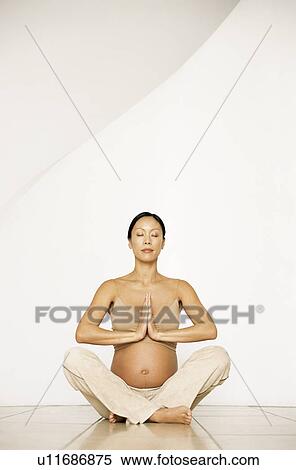 Stock Photography - Yoga in pregnancy. Fotosearch