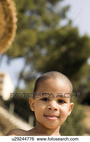 Stock Photograph - Young boy. Fotosearch
