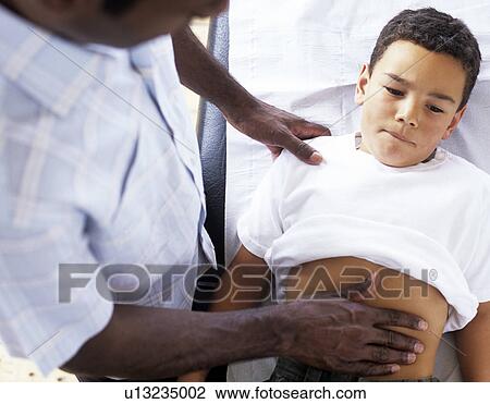 Abdomen examination View Large Photo Image Stock Image - Abdomen examination. Fotosearch