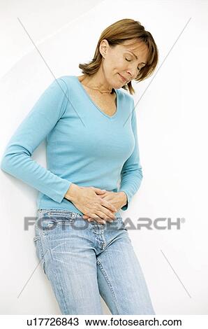 Stock Image - Abdominal pain. Fotosearch