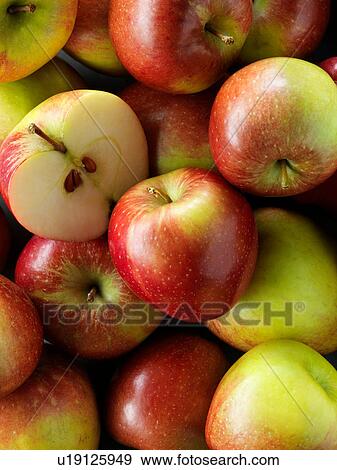 Stock Photo - Apples, full frame, close-up. Fotosearch