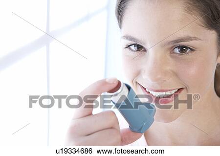 Stock Photograph - Asthma inhaler. Fotosearch