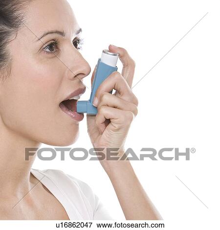 Stock Photo - Asthma inhaler use. Fotosearch