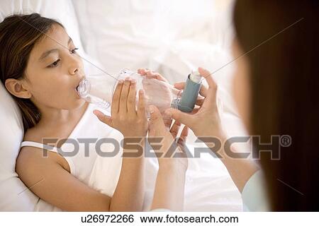 Stock Photograph - Asthma spacer. Fotosearch