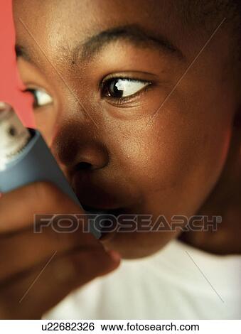 Stock Photograph - Asthmatic boy. Fotosearch